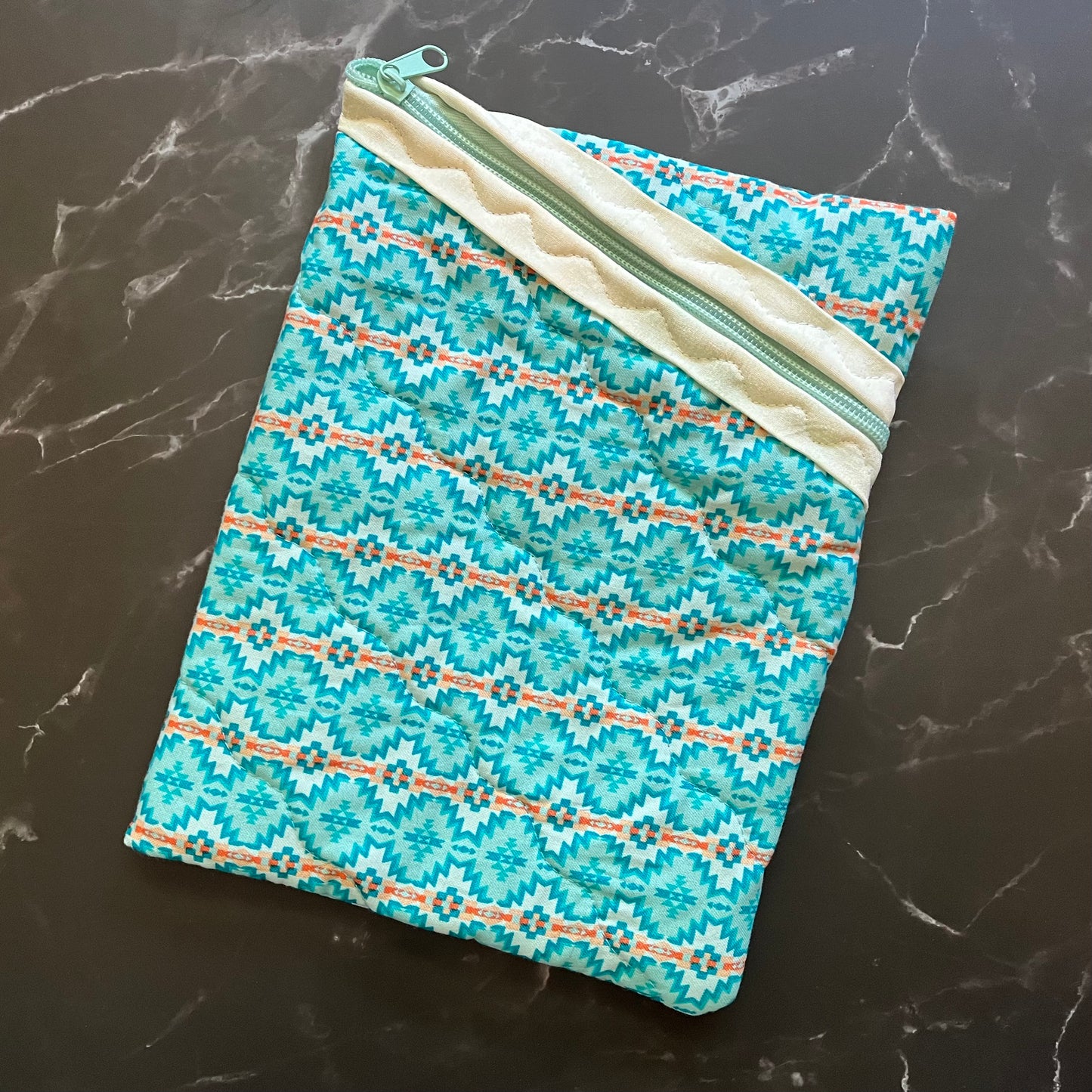 Book sleeves are perfect for protecting your books and electronics while traveling.