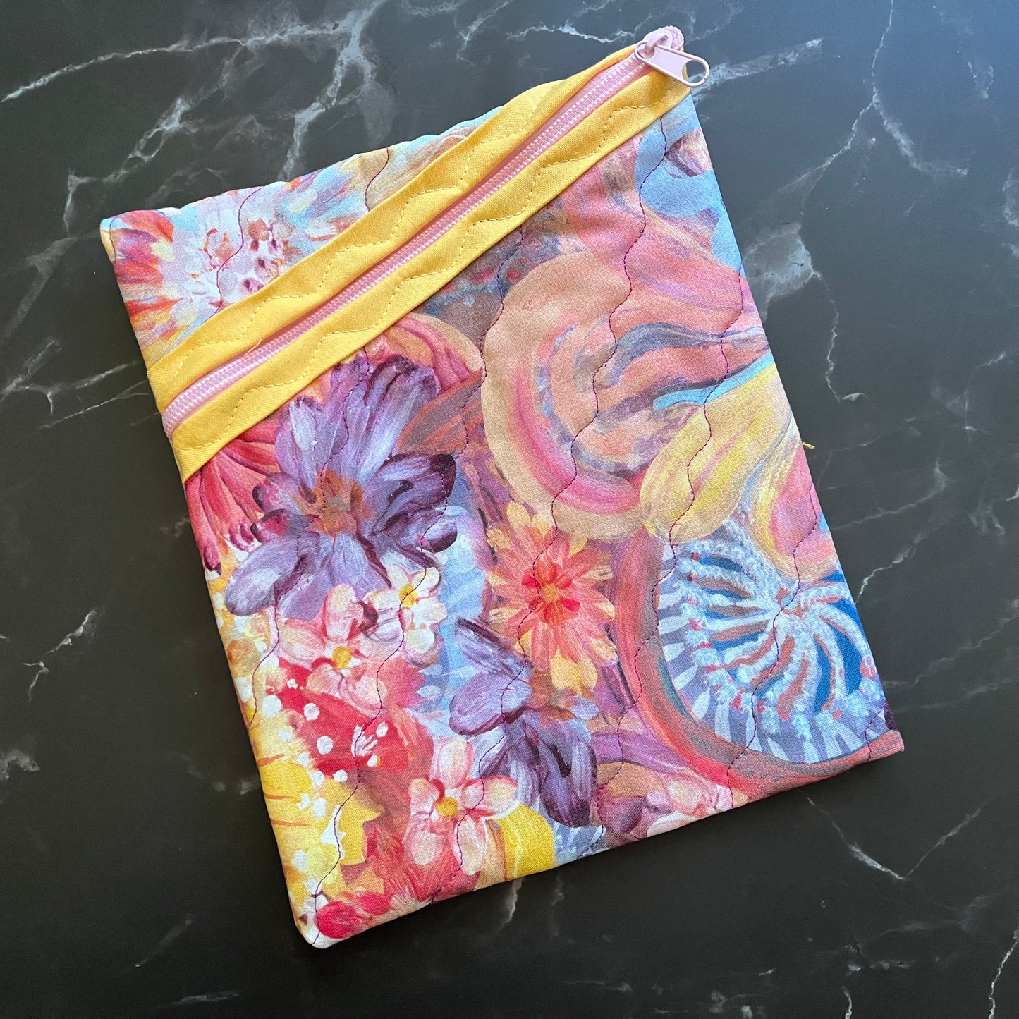 Book sleeves are perfect for protecting your books and electronics while traveling.