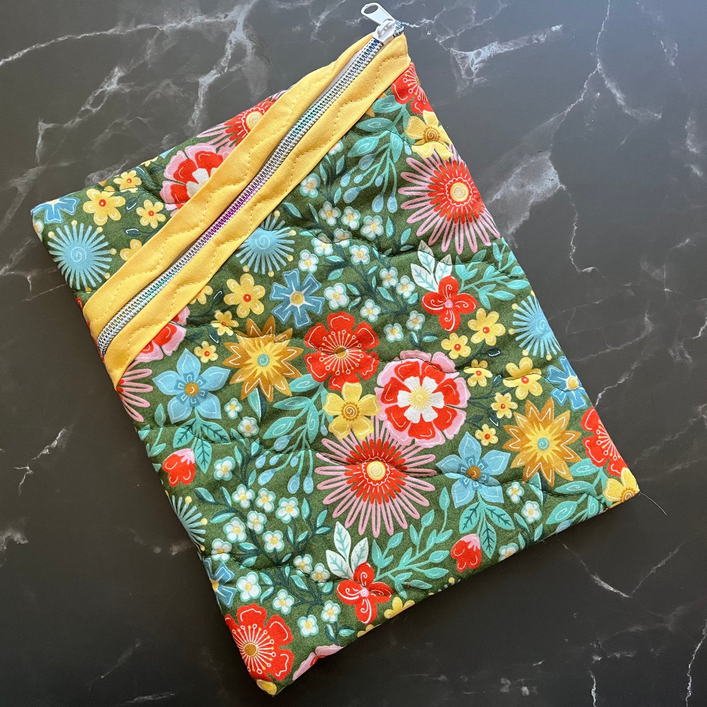 Book sleeves are perfect for protecting your books and electronics while traveling.
