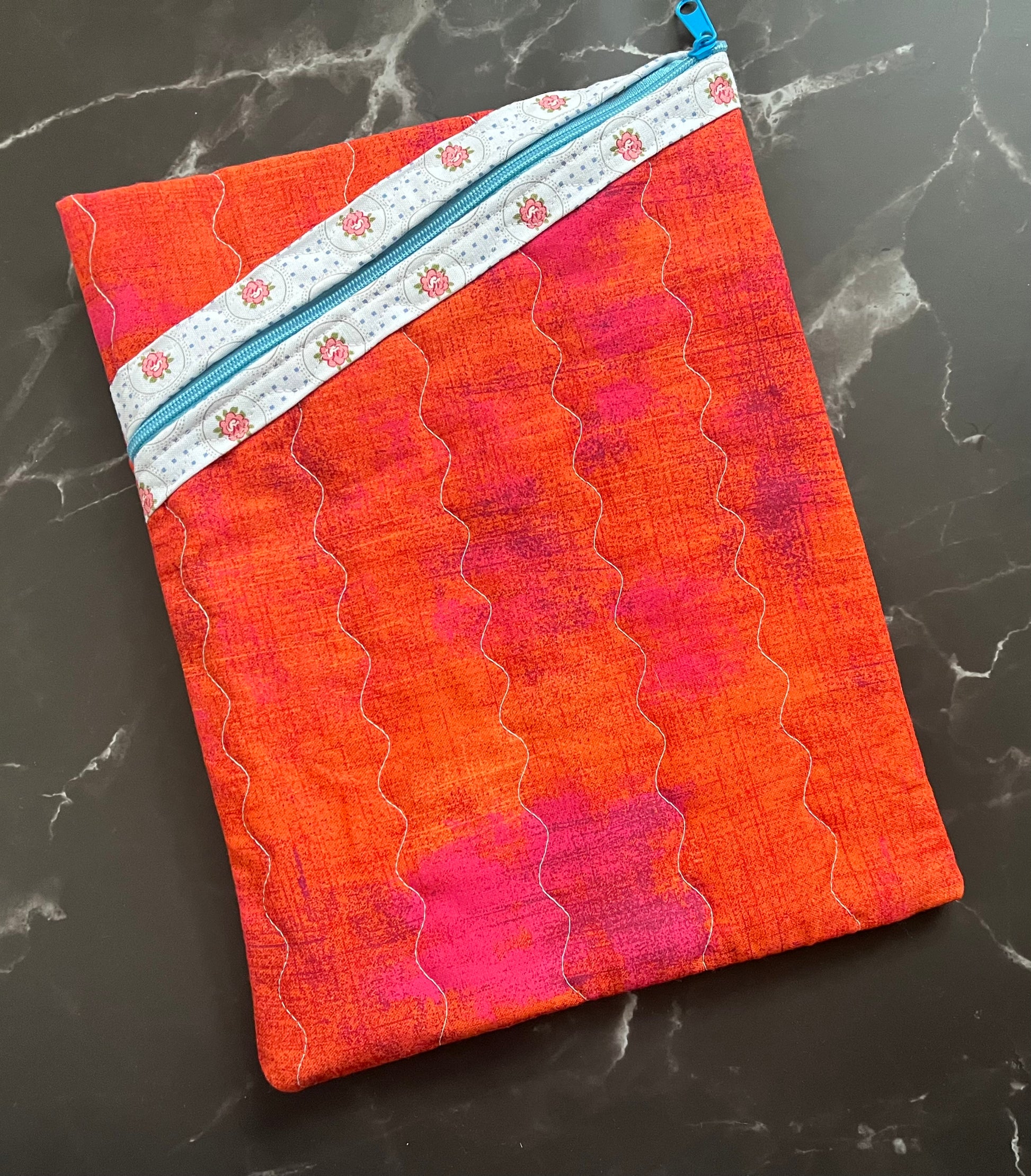Book sleeves are perfect for protecting your book and electronics while traveling.