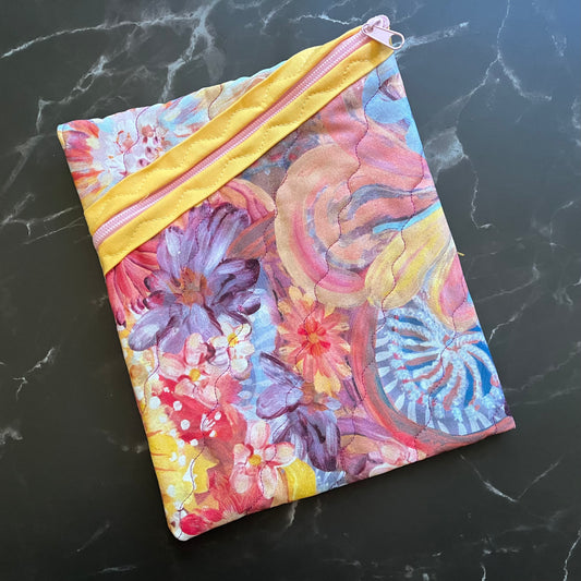 Book sleeves are perfect for protecting your books and electronics while traveling.